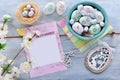 Easter flat lay with colorful eggs and decors