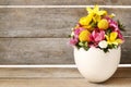 Easter floral arrangement in white egg shell Royalty Free Stock Photo