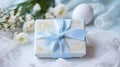 Easter Gift Box With Blue Ribbon And White Roses