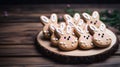 Easter gingerbread cookies in the form of rabbits on a wooden background