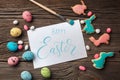 Easter gingerbread cookies on wooden table. Rabbits and eggs. Greeting card Royalty Free Stock Photo