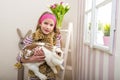 Easter - Girl carries a huge rabbit live