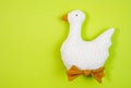 Easter goose made by hands on a bright background