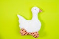 Easter goose made by hands on a bright background