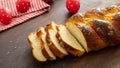 Easter greek tsoureki braid, sweet bread brioche on wood Royalty Free Stock Photo
