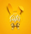 Easter greeting card. Paper silhouette of rabbit head and glitter golden ribbon bow.