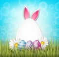 Easter greeting card with realistic 3d aggs, flowers, grass, and bunny ears on blue background.