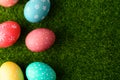 Easter greetings. Easter painted eggs on green grass. Spring religious holiday Easter Royalty Free Stock Photo