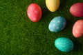 Easter greetings. Easter painted eggs on green grass. Spring religious holiday Easter Royalty Free Stock Photo