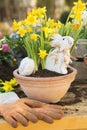 Easter handmade decoration with spring flowers and bunny at home
