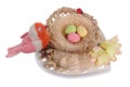 Easter handmade  nest on clay plate  from rope  and  funny  bird from  sheep wool   isolated Royalty Free Stock Photo