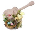 Easter handmade  nest from rope  with funny  paper bird and old guitar  and eggs isolated Royalty Free Stock Photo