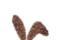 Easter holiday background with bunny ears made of freshly roasted coffee beans on a white background. Creative easter concept.