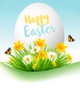 Easter Holiday Background. Colofrul eggs in green grass