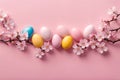 Easter holiday background, painted eggs and cherry tree flowers on pink, Greeting card or banner Royalty Free Stock Photo