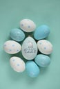 Easter holiday. Blue and white speckled Easter eggs with bunny on a light blue background.Spring festive easter Royalty Free Stock Photo
