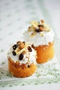 Easter holiday cake with nuts dried fruits on white tablecloth