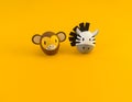 Easter holiday concept with cute handmade eggs: monkey and zebra Royalty Free Stock Photo