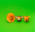 Easter holiday concept with cute handmade eggs: orange tiger and lion,monkey