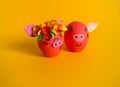 Easter holiday concept with cute handmade eggs: pink pig. Friends piglets