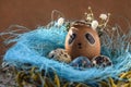 Easter holiday concept with cute handmade eggs, rabbit, chicks, owl, panda and deer. Creative eggs for Easter.