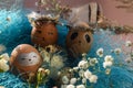 Easter holiday concept with cute handmade eggs, rabbit, chicks, owl, panda and deer. Creative eggs for Easter.