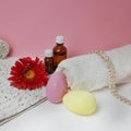 Easter holiday spa products on pink background.