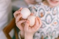 easter holiday time in spring season. traditional children hands are shackling, jarping or dumping with eggs Royalty Free Stock Photo