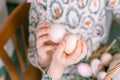 easter holiday time in spring season. traditional children hands are shackling, jarping or dumping with eggs Royalty Free Stock Photo