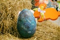 Easter holidays concept. blue decorative easter egg with yellow rabbit. Easter. holiday composition. large easter egg on Royalty Free Stock Photo