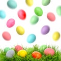 Easter holidays decoration. Colored eggs in green grass