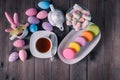 Easter kid breakfst with colored macaroon Royalty Free Stock Photo