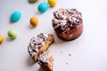 Easter Kraffin on a light background with colored, bright eggs. Cake with raisins, chocolate, nuts