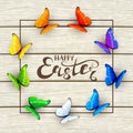 Easter lettering and butterflies on white wooden background Royalty Free Stock Photo