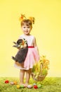 Easter little girl, child bunny rabbit and eggs