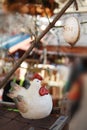 Easter market decor with chicken, cock, ribbons, birds, eggs.