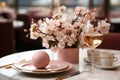 Easter table setting with egg, spring blossom flowers. Generative AI Royalty Free Stock Photo