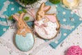 Easter multicolored rabbits egg honey-cake, grass, food photography