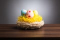 Easter nest with decoration eggs on table, gray background