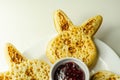 Easter nice bunny shaped crumpets served with raspberry jam, funny food for kids Royalty Free Stock Photo