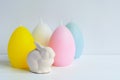 Easter Ostara, Eoster bunny with egg shaped candles Royalty Free Stock Photo