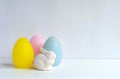 Easter Ostara, Eoster bunny with egg shaped candles Royalty Free Stock Photo