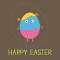 Easter painted egg with cute face. Card. Royalty Free Stock Photo