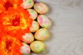 Easter painted eggs on a background of festive flowers. The Easter egg is a ceremonial food and a ritual symbol in Christian Royalty Free Stock Photo