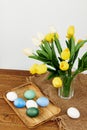 Easter painted eggs flower bouquet wooden tray holiday