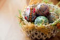 Easter painted eggs in traditional basket
