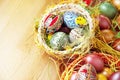 Easter painted eggs in traditional basket Royalty Free Stock Photo
