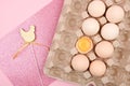 Easter pink. Egg on a wooden spoon. A tray of eggs on a white and pink background. eco tray with testicles. minimalistic trend, Royalty Free Stock Photo