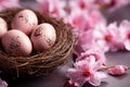 Easter poster with Flower and Easter eggs in the nest on light pink background