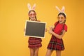 easter rabbit children. Children play in rabbit ears. little girls wearing bunny ears. Easter composition. egg hunt fun